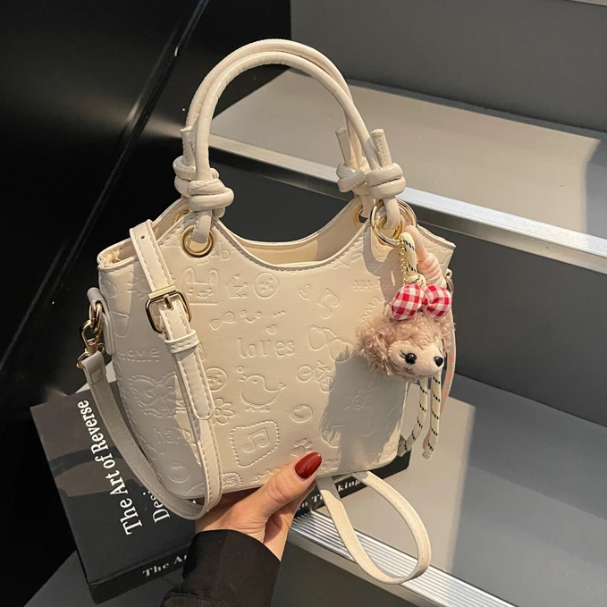 帆布感精致水桶包包女士2025新款手提小包简约通勤网红斜挎包