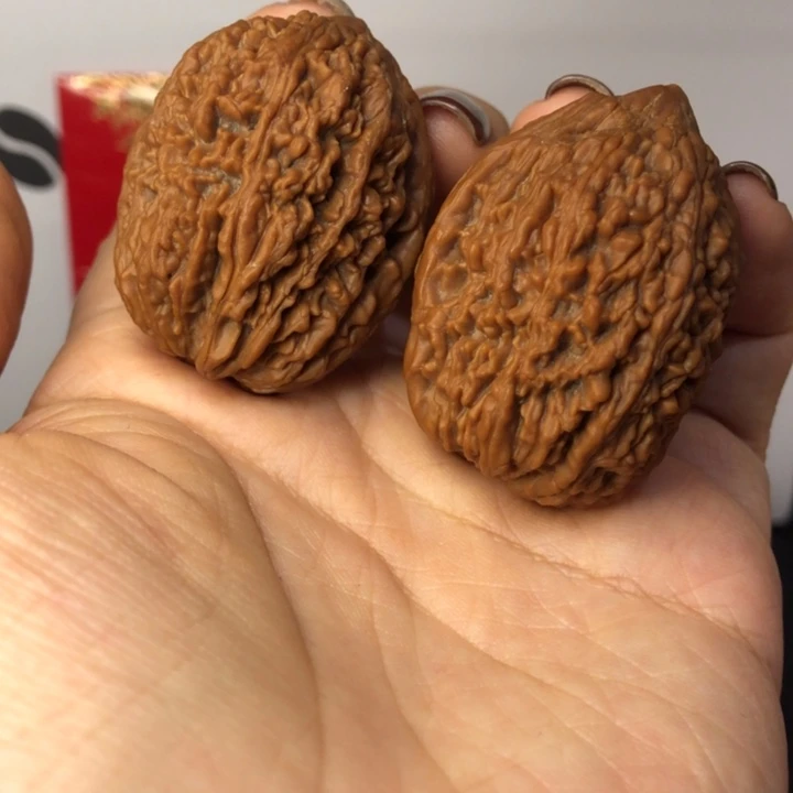 阿***杜吊坠桃核大蒜头红皮