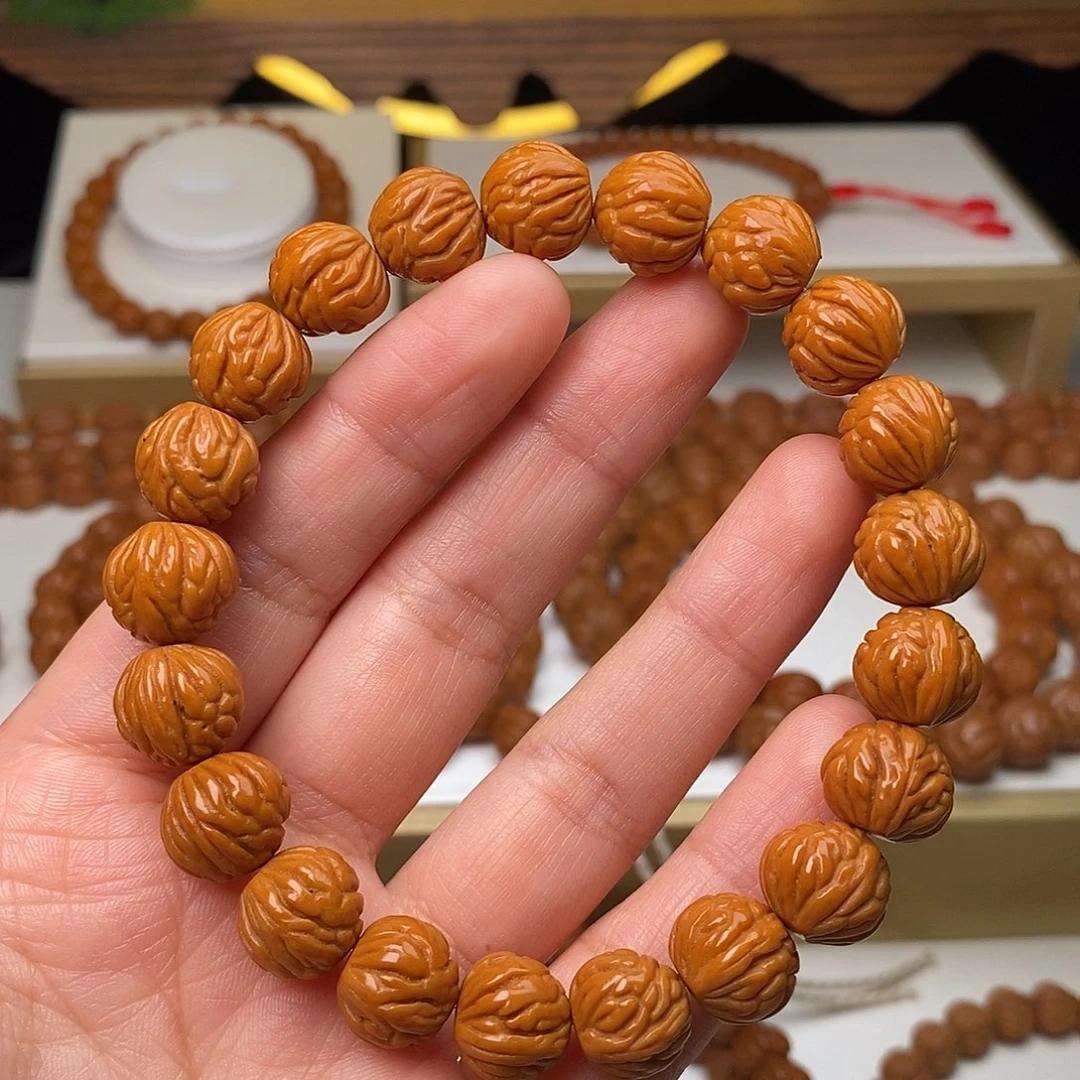 桃核手串12mm野生凤羽聚宝盆桃核手串（活动价）