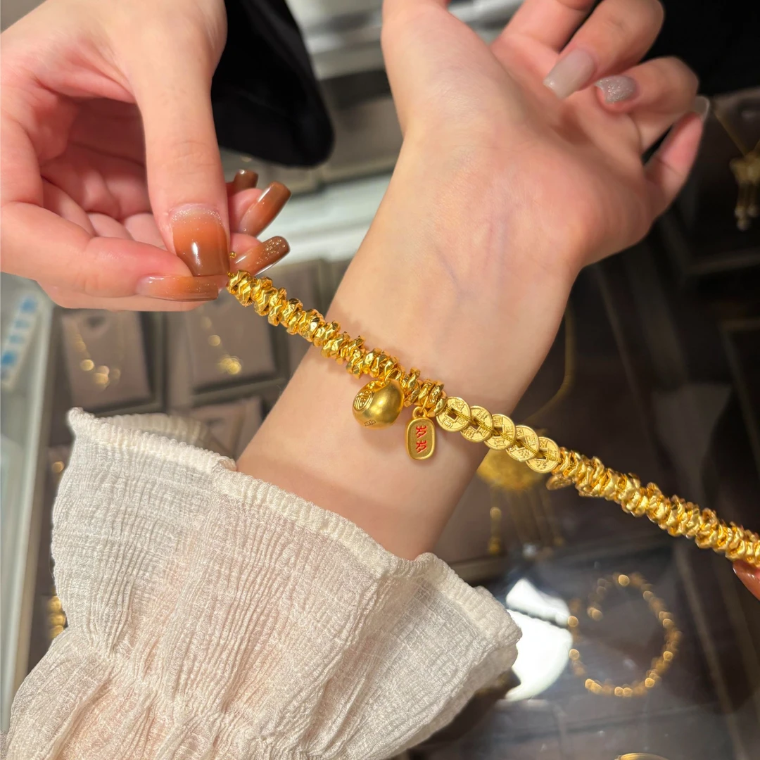 瑞诺黄金五帝钱盘缠手链女2025新款999足金小财神编织手绳送女友