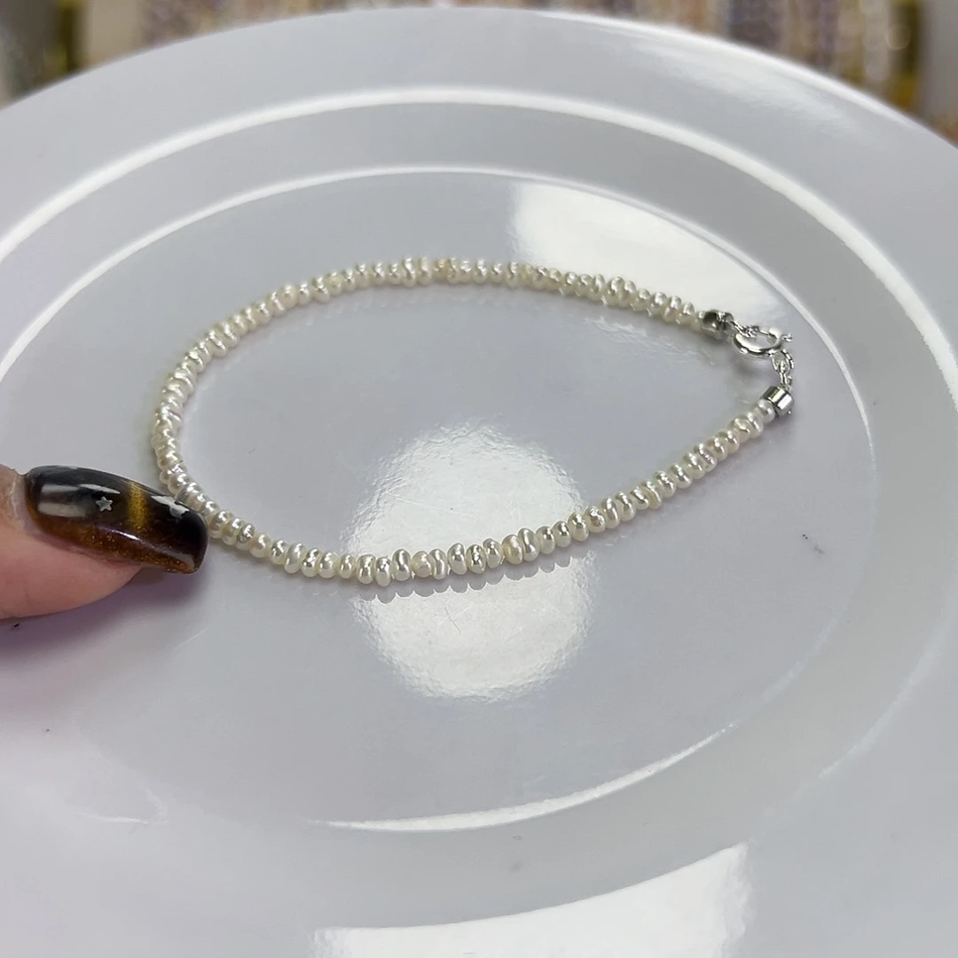 手绳淡水珍珠钛钢
