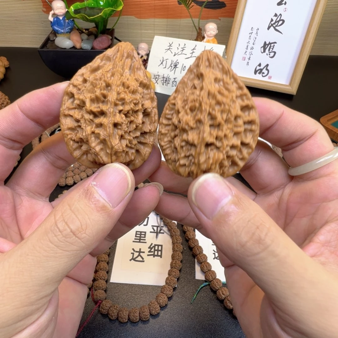 把件文玩核桃回血文玩核桃麻核桃鸭嘴兽狮子头一对41尺
