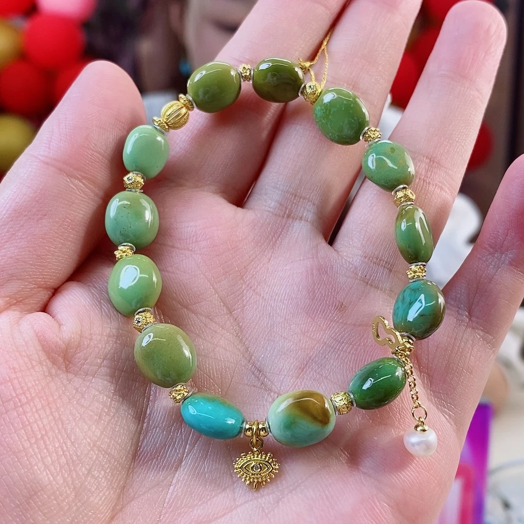 曼***茶绿松石银S925镀金镶嵌珠宝奇石