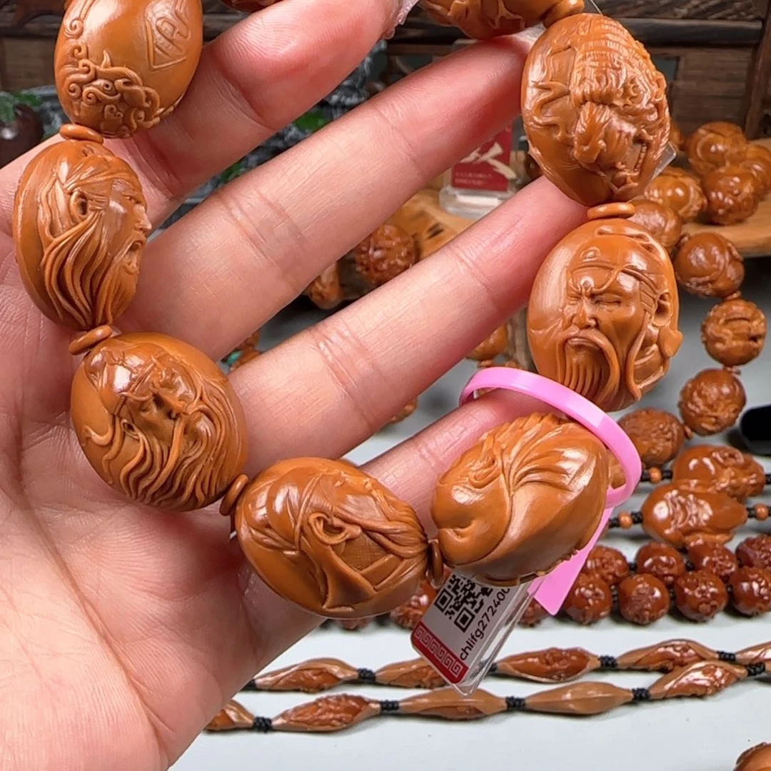 橄榄核手串/手链用****6宽2.1梅林鸡血红核双面浮雕关公