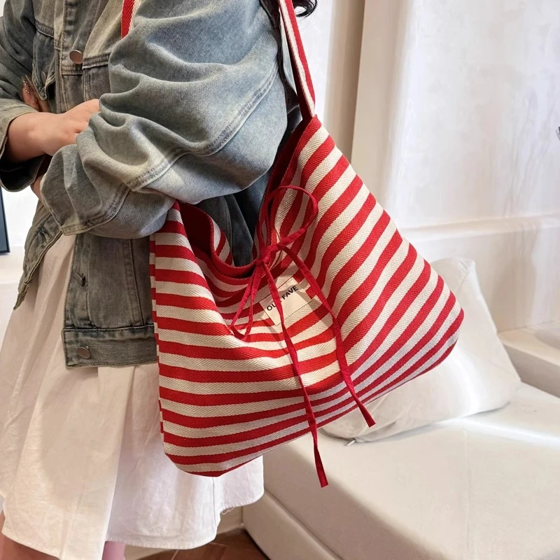 简约休闲条纹软面大容量包包女式2025新款学生上课通勤单肩斜挎包