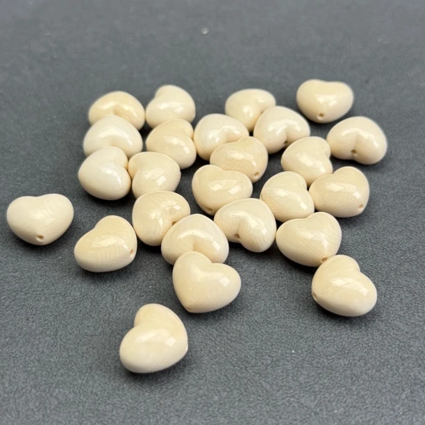 A087天然猛犸象牙 果冻料爱心上下孔15mm一个 百搭设计