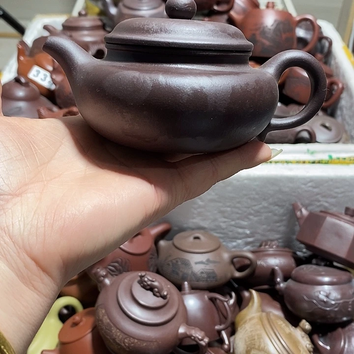 紫砂茶壶微瑕微笑