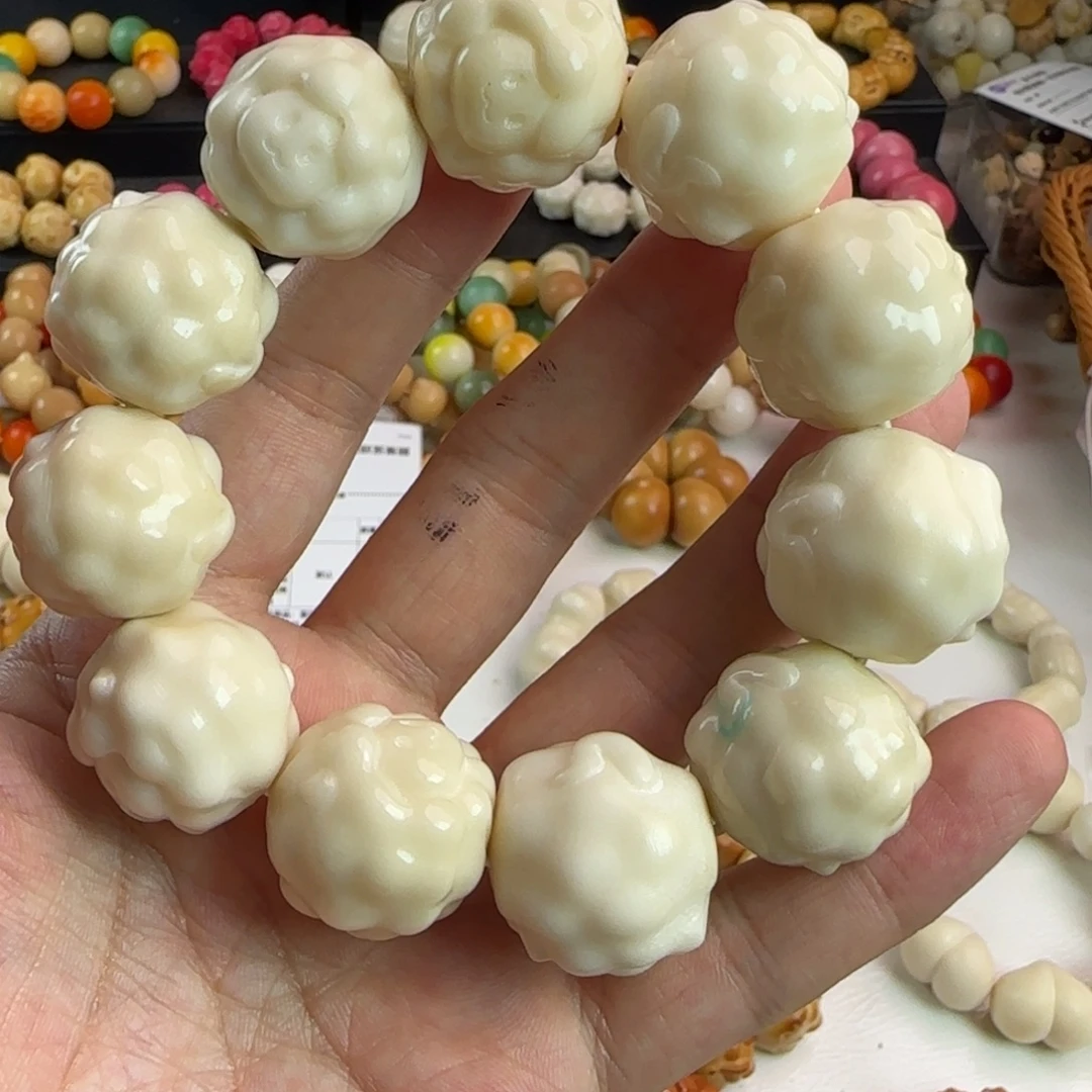 菩提根/象牙果吊坠瑕疵卡25云朵羊手串一条有裂