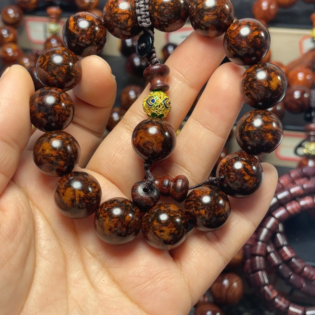 云***海花梨木类1.5的龙鳞芝麻点2串