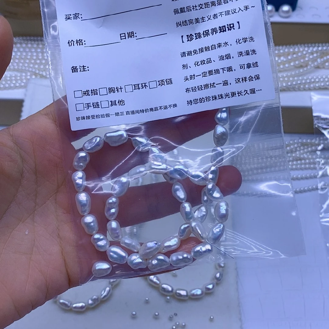 淡水珍珠银S925镶嵌颈饰蝴***姐