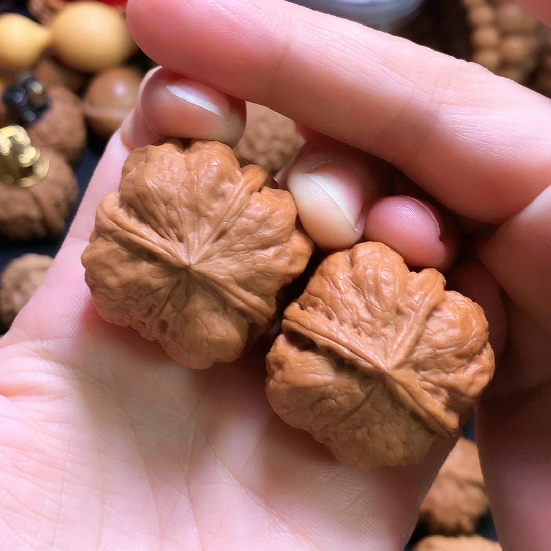 文玩核桃把件三棱丁