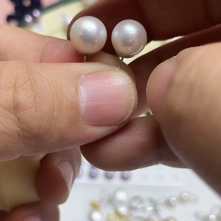 哈***怪银S925镶嵌淡水珍珠耳饰