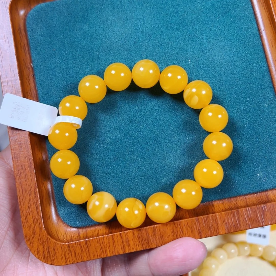 未镶嵌琥珀手链焦皮橘色克重20.70