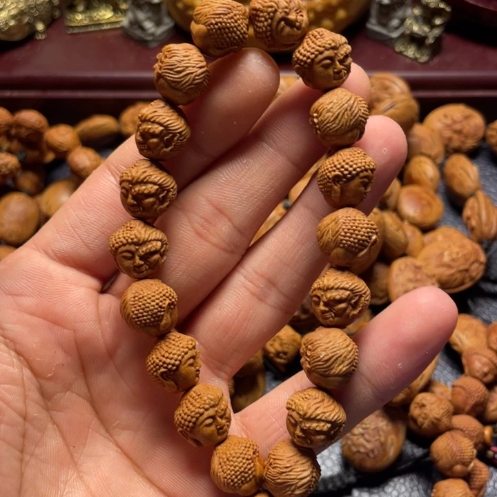 龙纹桃核雕刻佛魔一念
