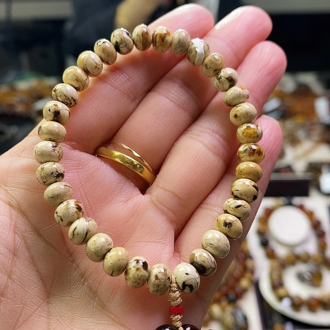 琥珀未镶嵌裸石精品干白花6.5mm+