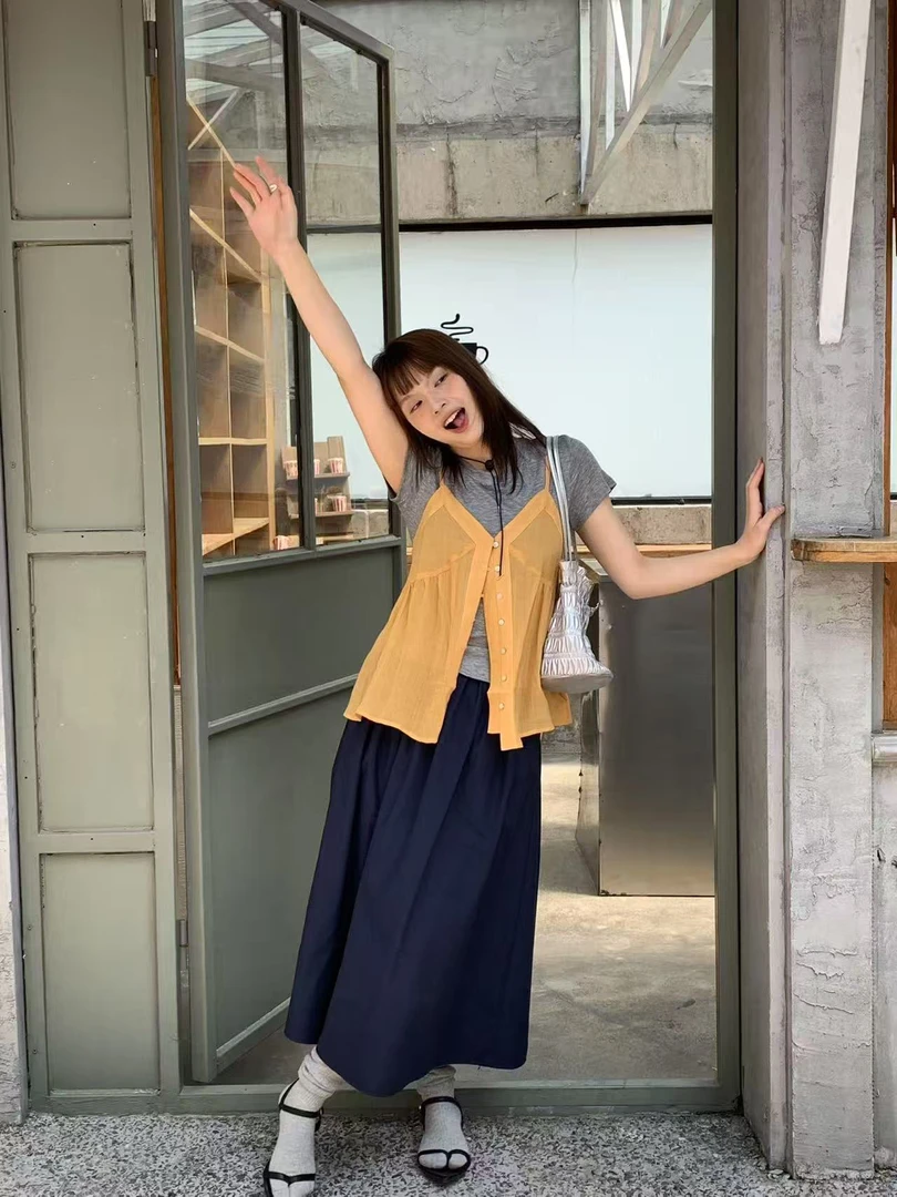 韩系文艺新款流行显瘦黑白百搭半身裙气质时尚韩版休闲纯色