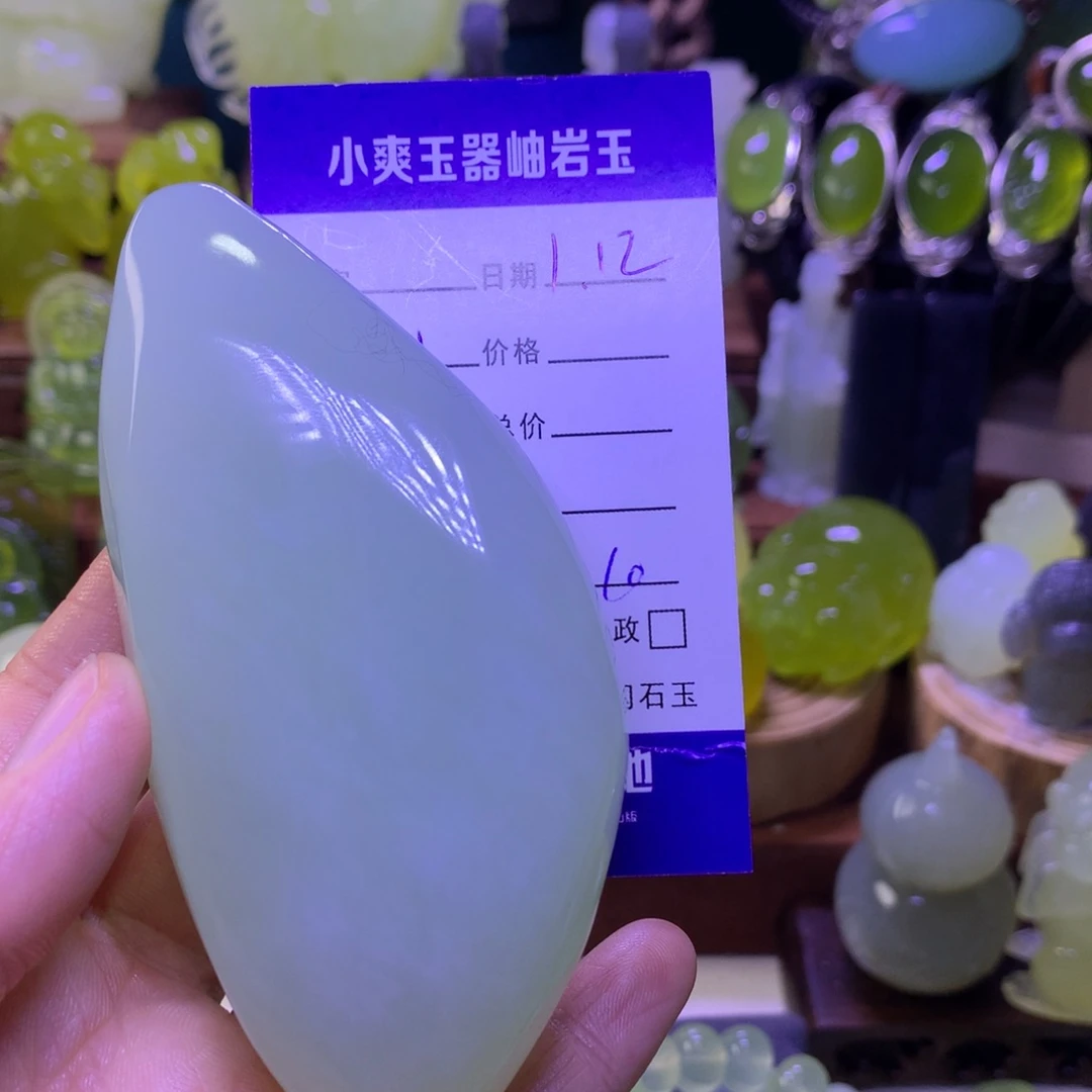 岫玉手把件未镶嵌***约