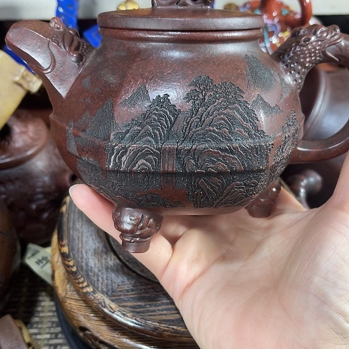 茶壶紫砂原矿泥料手工制作的一把紫砂壶。
