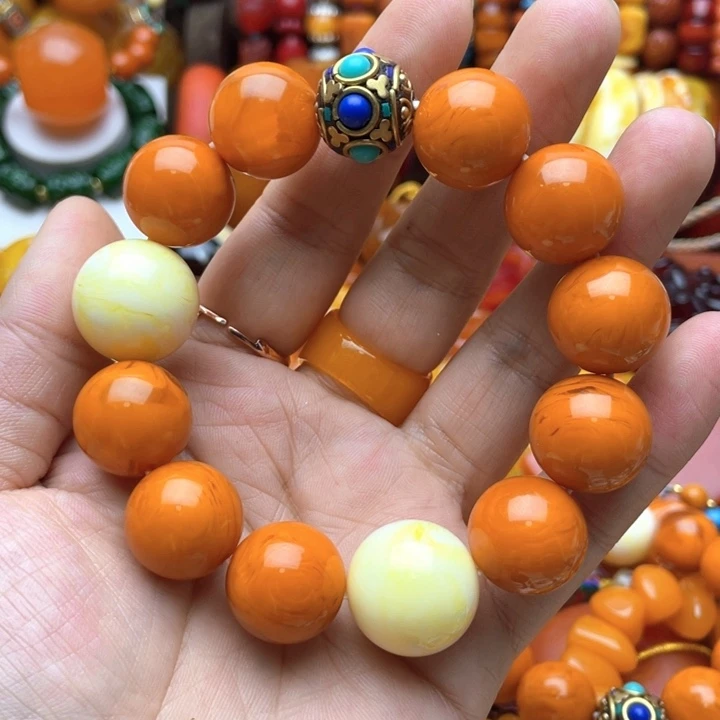 树脂制品7号橘色手串