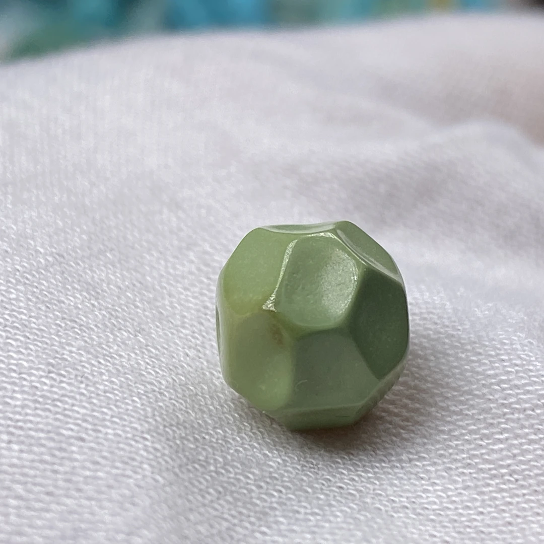 原矿绿松石菜籽黄无相珠 9.8*9mm重1.3克