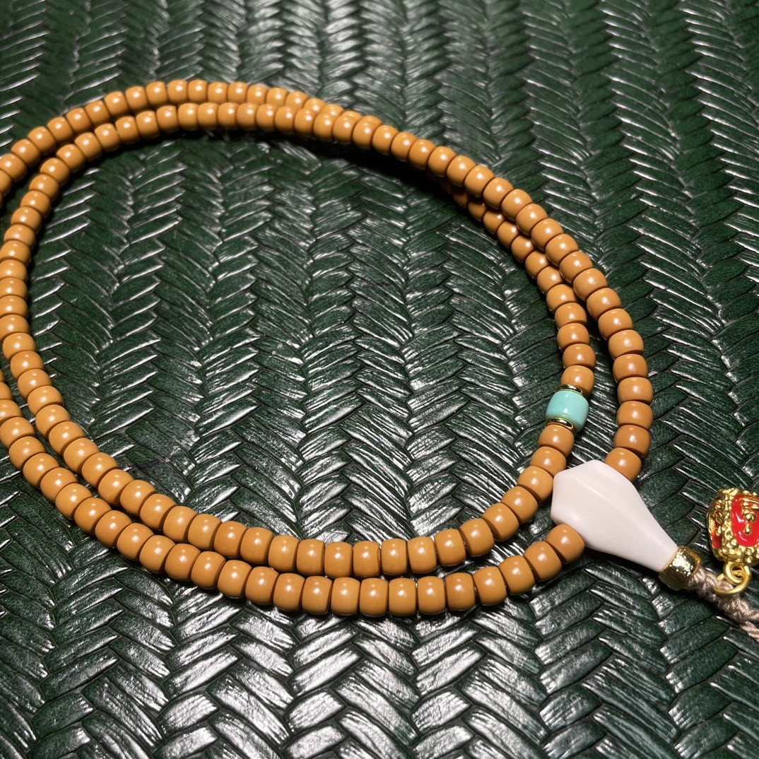 5.2精品橄榄核尖直切长串脖挂