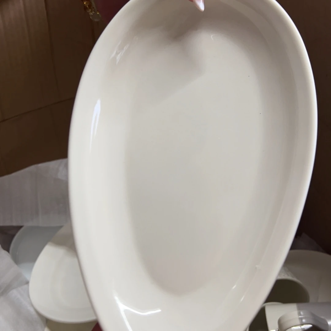 J***廷新骨瓷瑕疵慎拍暖白11.75寸水滴深盘鱼盘