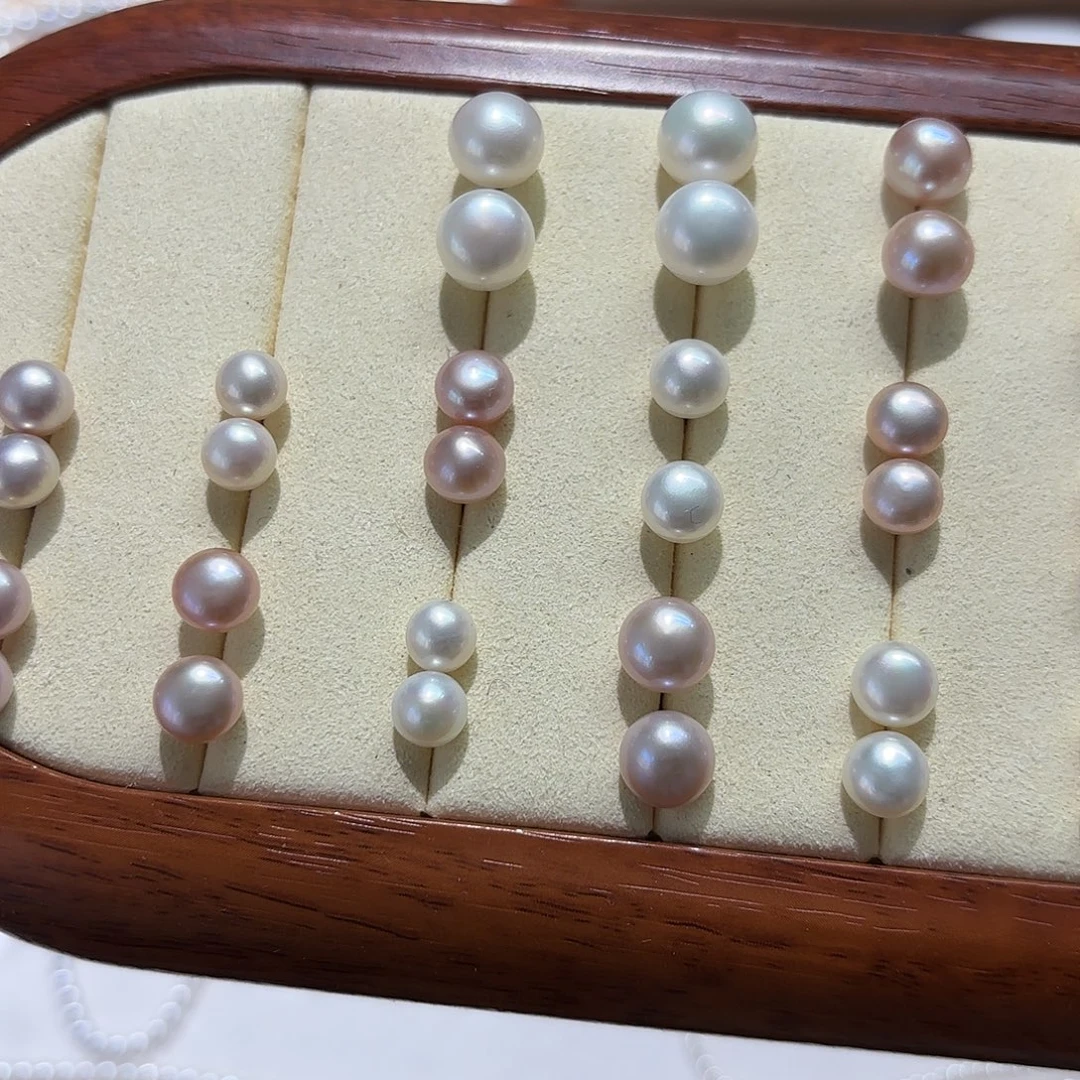 淡水珍珠银S925镶嵌耳饰