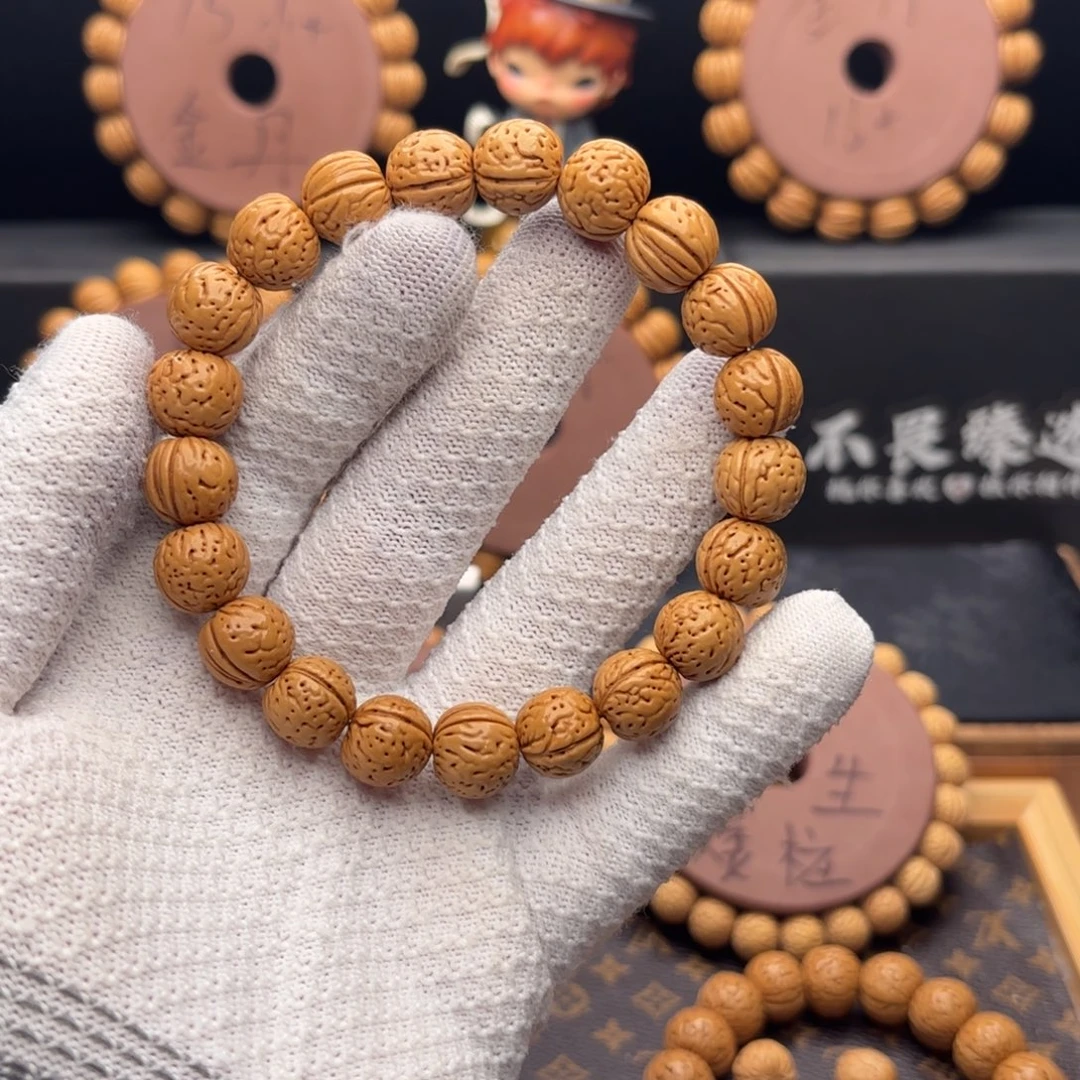 稀***涂手串桃核金丹桃核