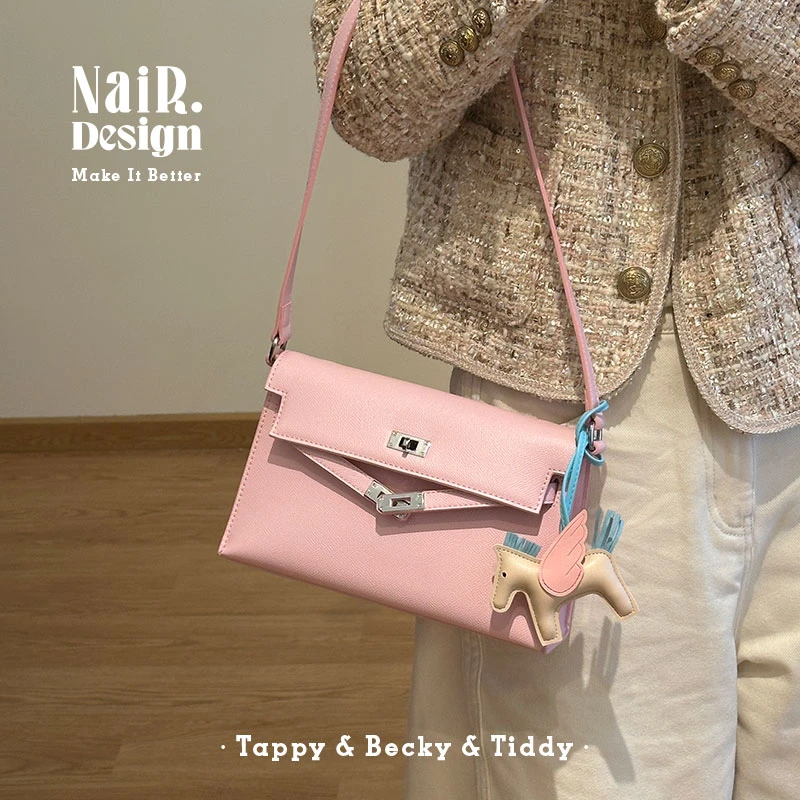 古莉奈尔樱花粉凯莉包单肩斜跨腋下通勤包女质感百搭时尚包包小众