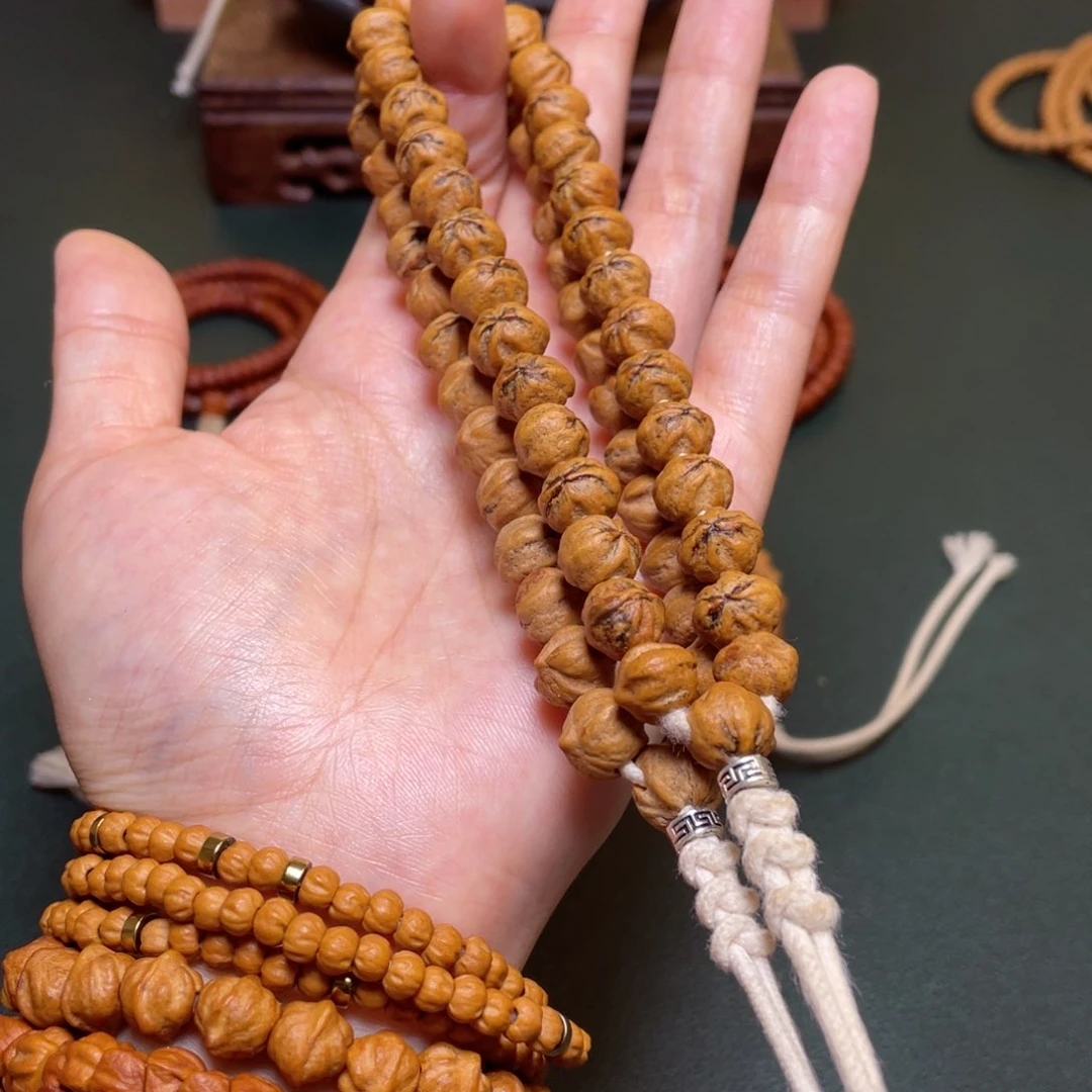 柏香籽/百香籽吊坠恶魔之眼手持