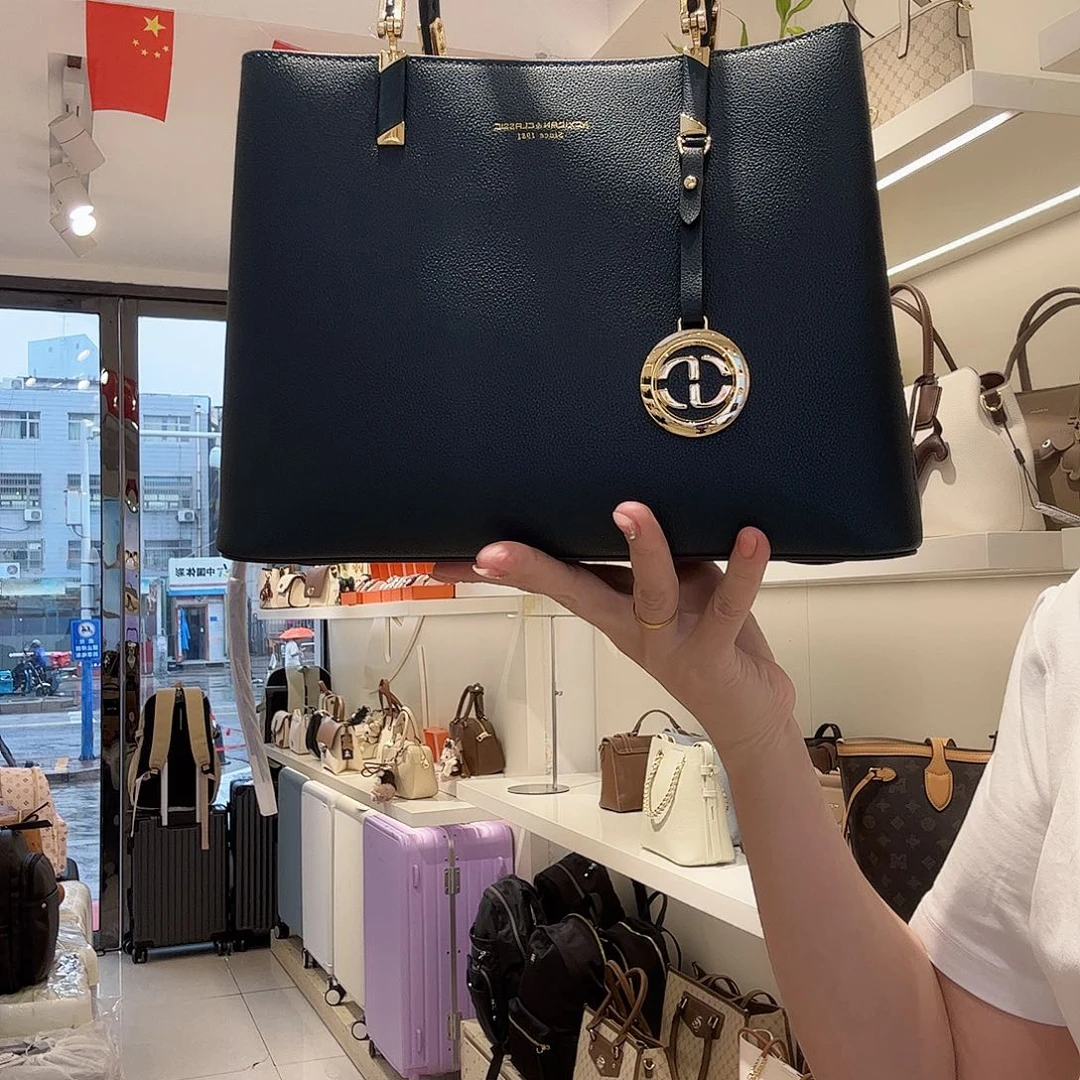 牛剖层皮革稻草人女包单肩手提包
