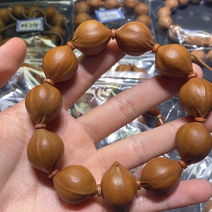 吃***陈吊坠橄榄核梅林铁核