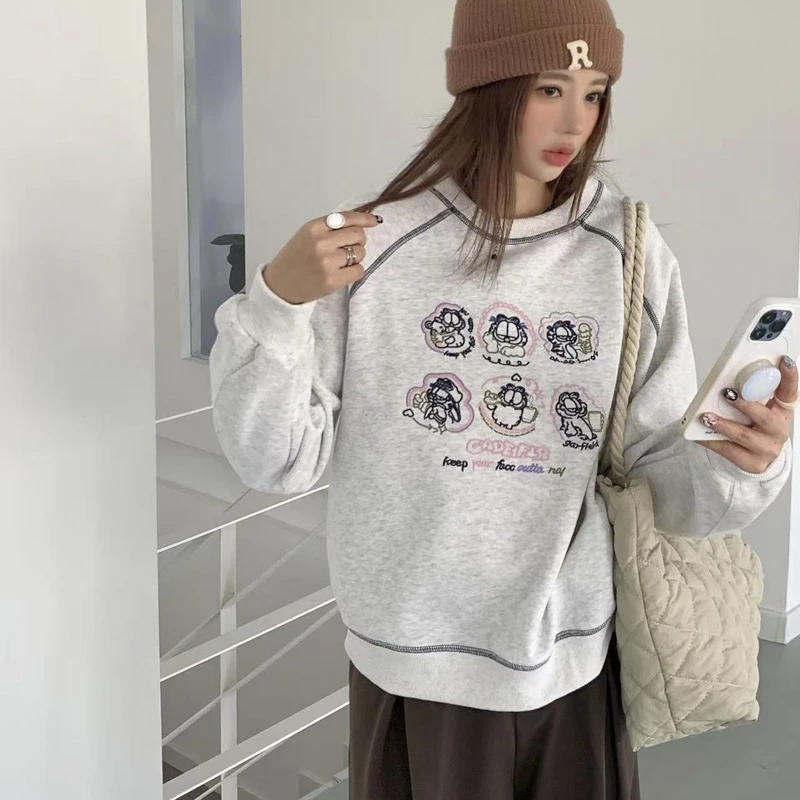 『超乎想象』明线撞色线条设计圆领韩系刺绣卡通图案2025早春系列