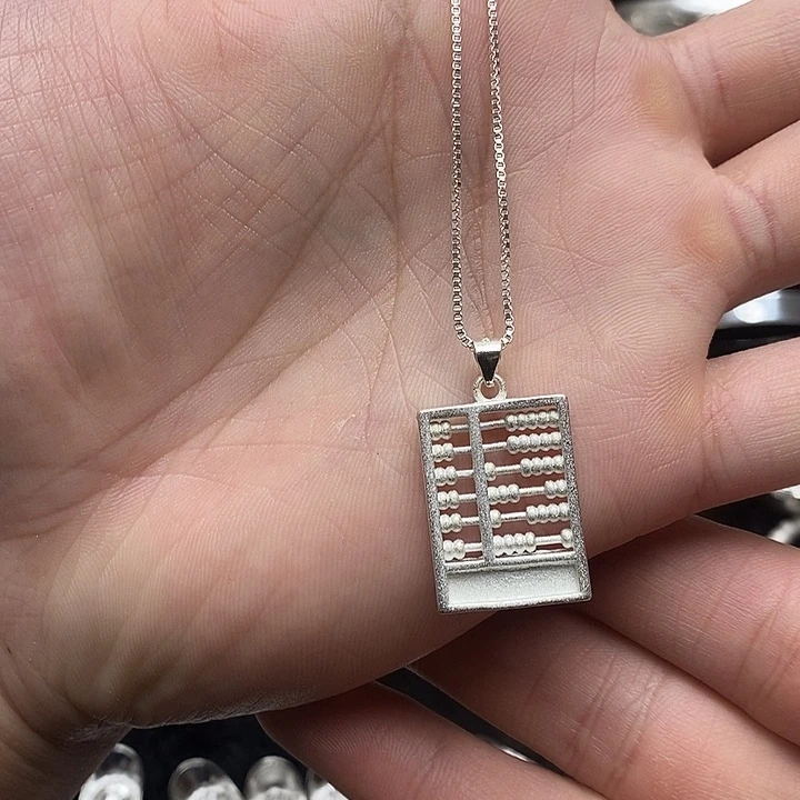 足银玻璃999算盘吊坠