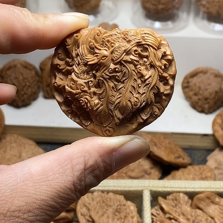 用***3桃核吊坠52龙凤呈祥