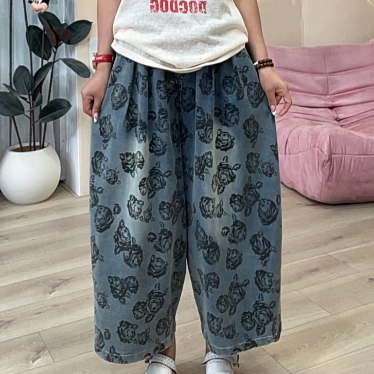 635欧货新款牛仔印黑色玫瑰花大做八分女裤