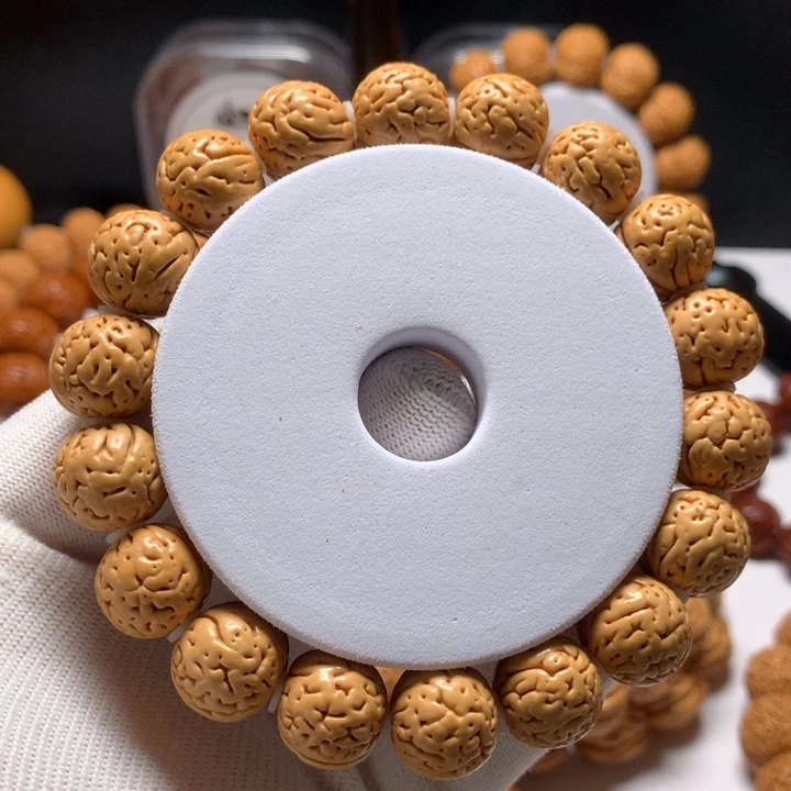 躲****桃核手串奶油皮肌肉纹桃核手串