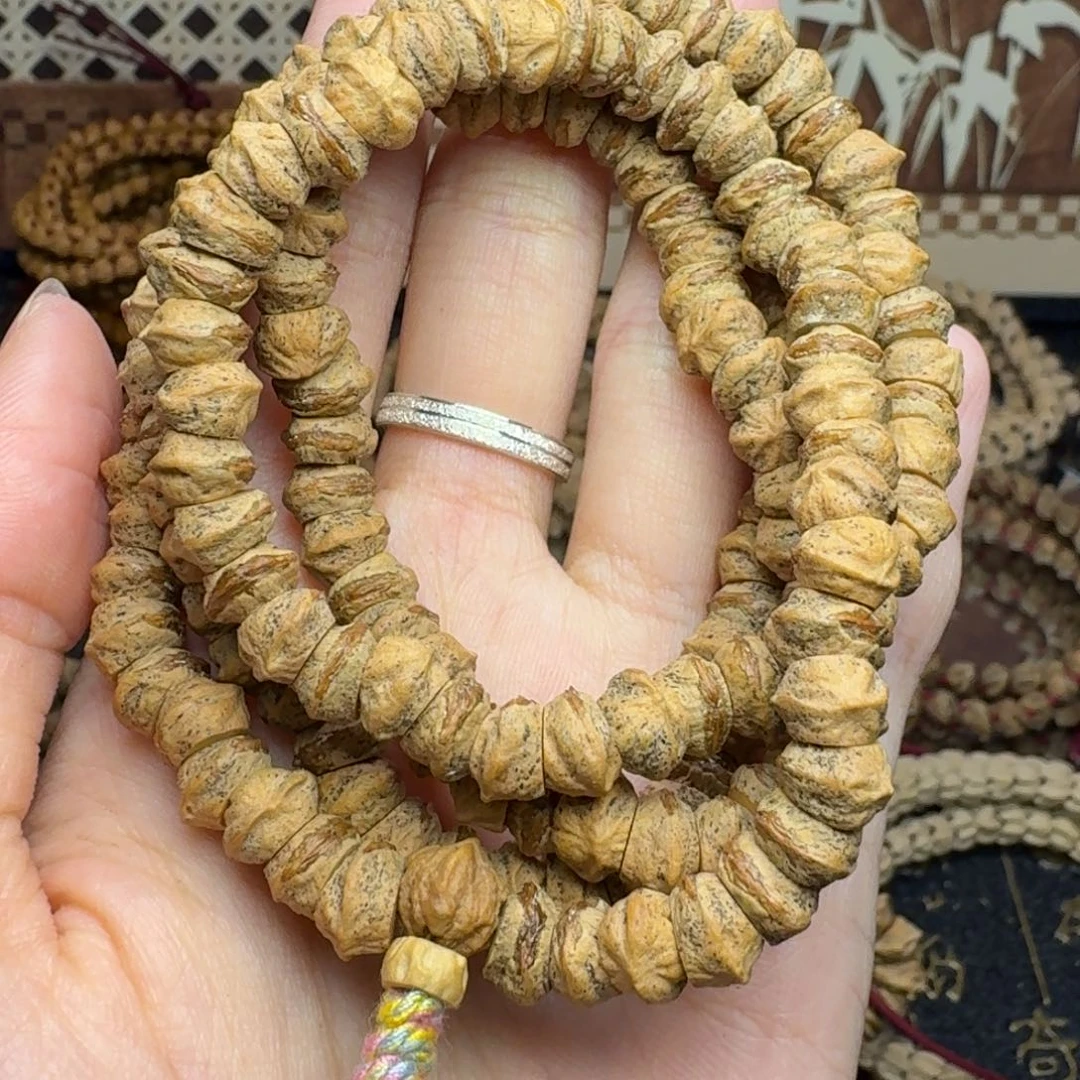 肚***兔柏香籽/百香籽手串斜切红芽