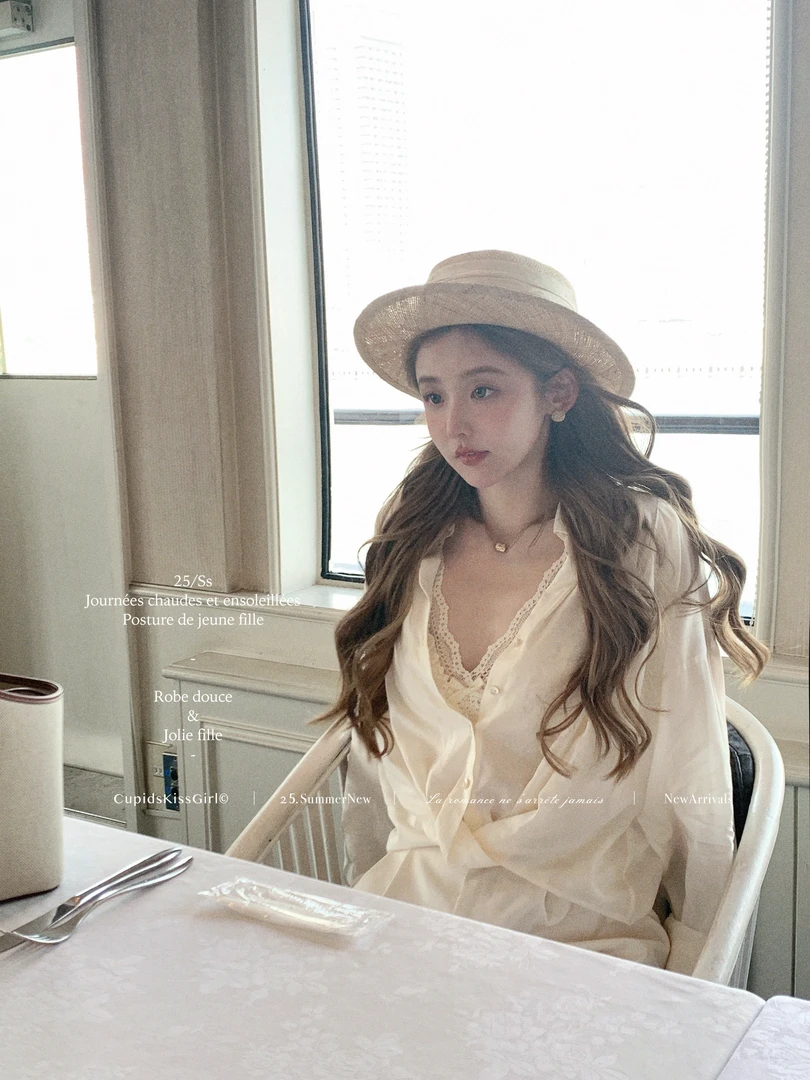 高级感纯欲辣妹长袖纽结衬衫内搭胸衣女2025年新款显瘦短裤子套装