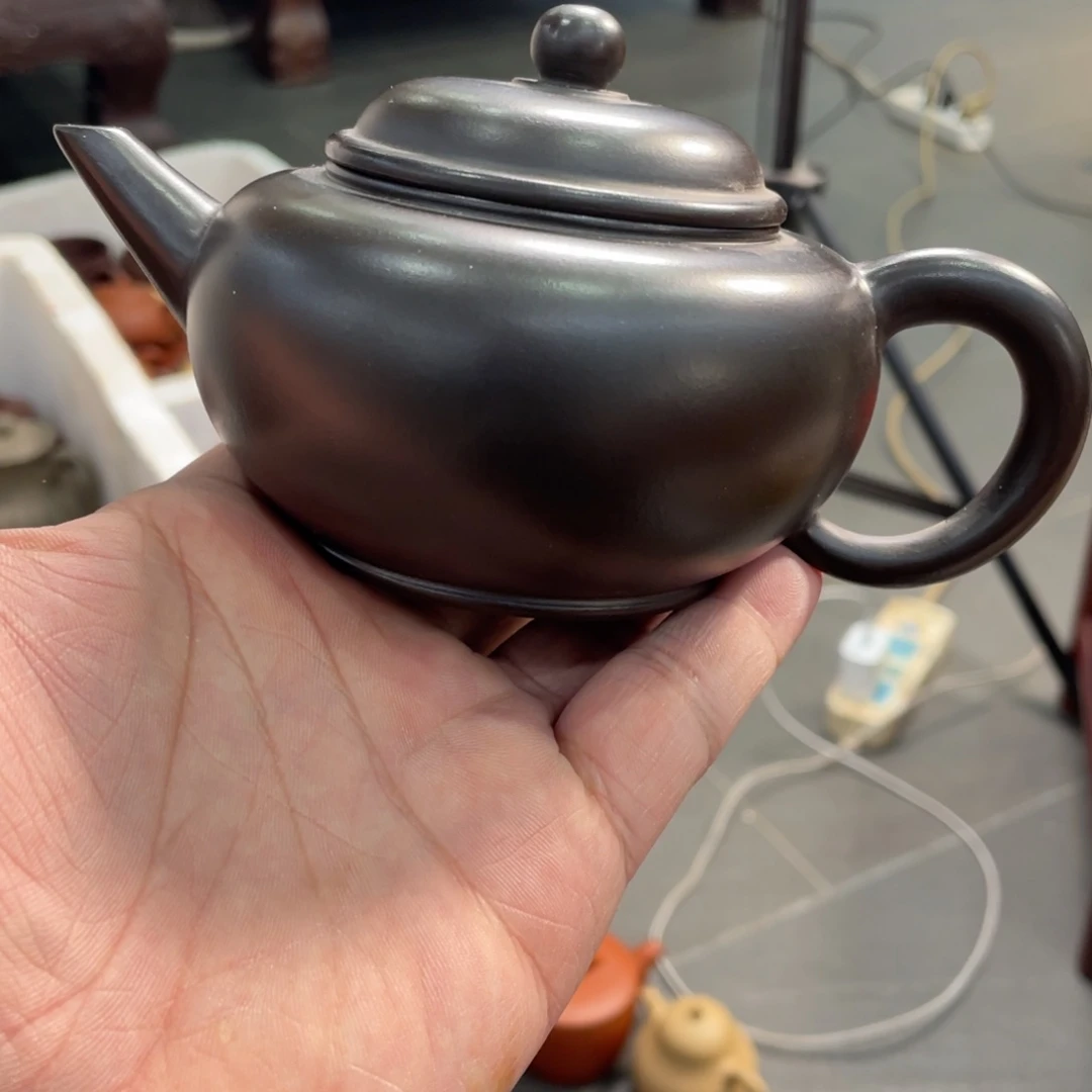 紫砂茶壶一哈打电话说哦就晓得