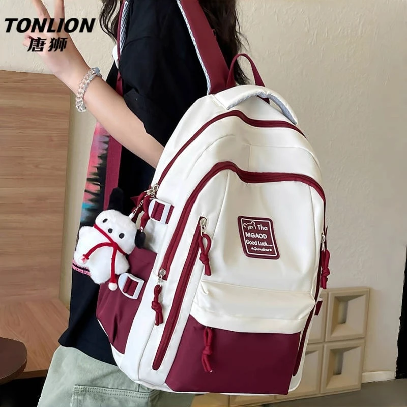 唐狮书包初中女生2025新款双肩包大容量中学大学生高颜值旅行背包