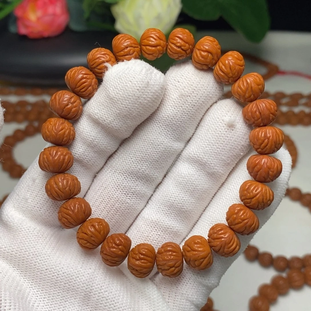 桃核手串11mm野生凤羽聚宝盆桃核手串（活动价）