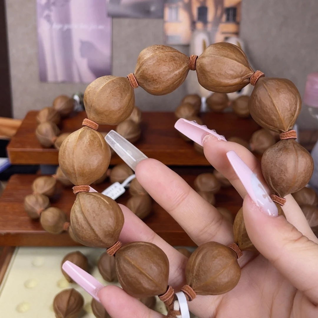 当***6手串/手链橄榄核20.5 25梅林铁核