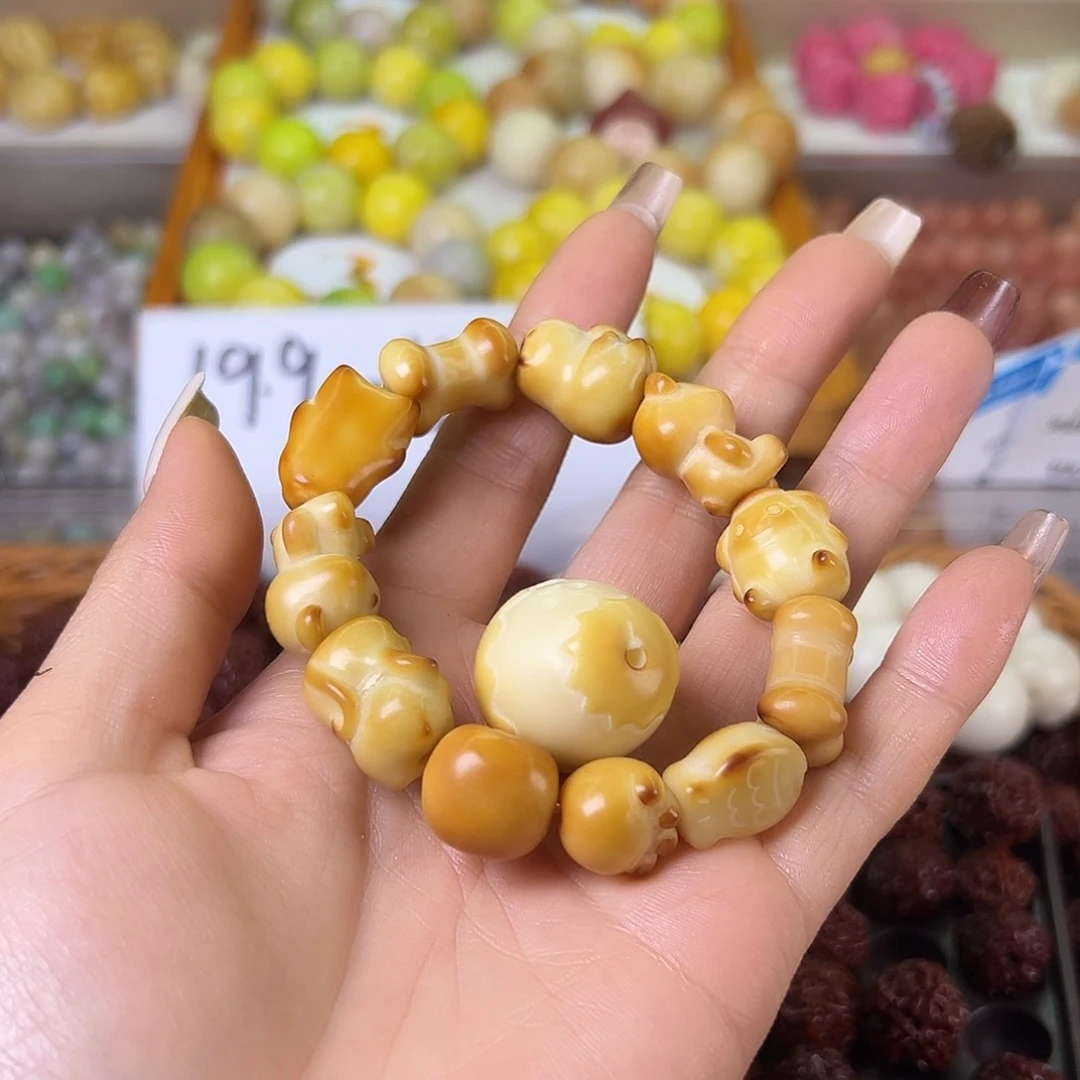 菩提根/象牙果吊坠金****）瑕疵串1条有裂有坏