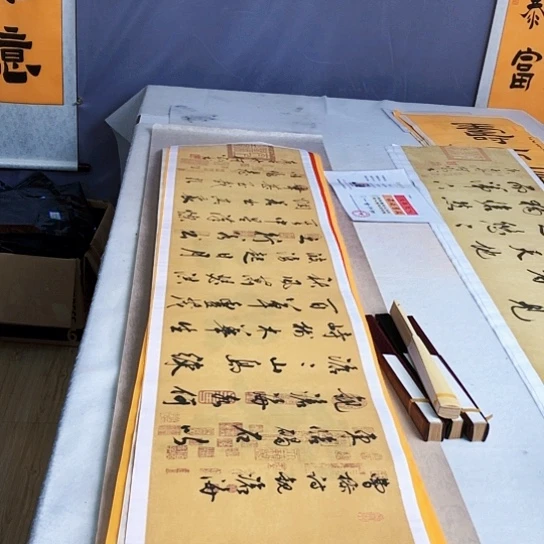 书法满5幅免费赠送一把扇子