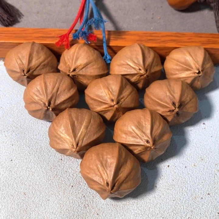 橄榄核手串28*29精品4花老树蒜头铁核9+1颗