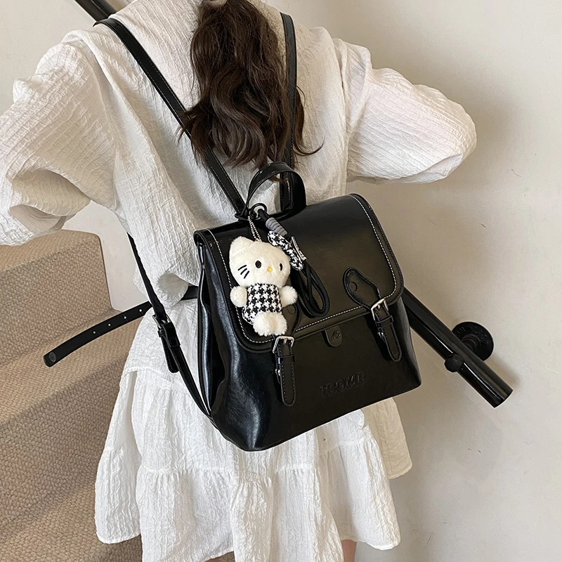 简约休闲双肩包女2025新款时尚油蜡皮手提书包春夏流行外出旅行包