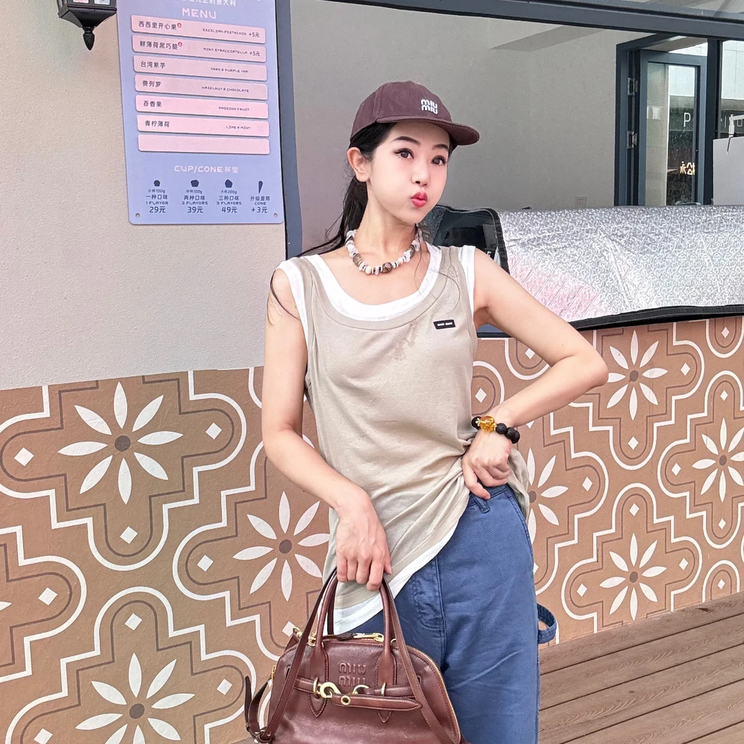 99新 MIU MIU/缪缪 假两件双层背心S码