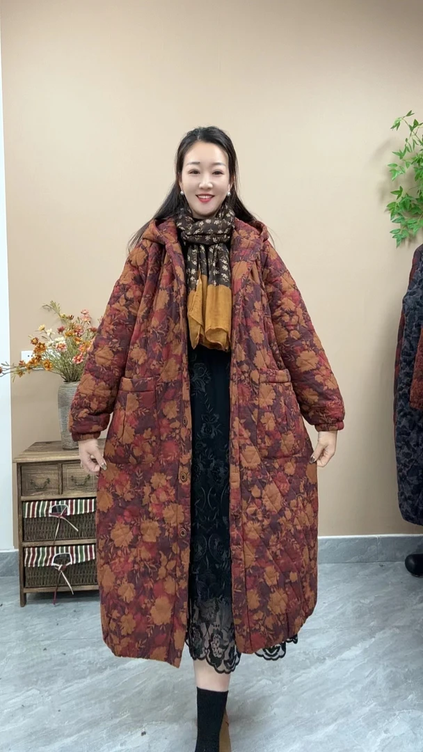 《金相喜》2025冬季连帽纽扣长款风衣女装加厚宽松休闲冬季长款外套