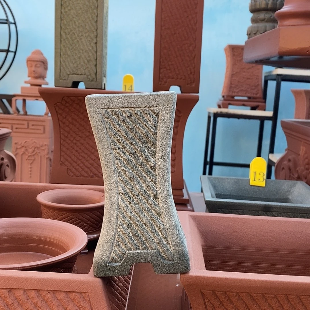 风***.品格石头花盆架了